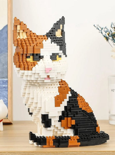Jeu de construction de chat de dessin animé assis