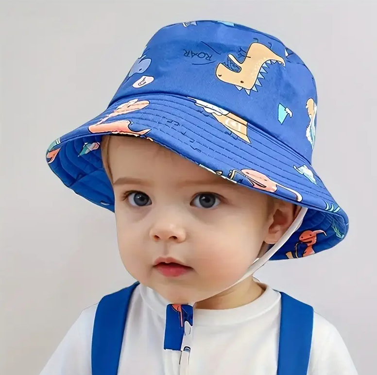 Bonnet enfant à motif dinosaure bleu