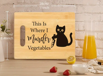 snijplank met zwarte kat