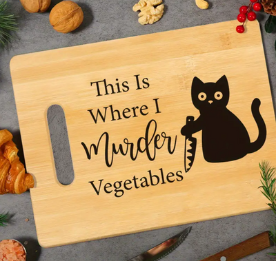 snijplank met zwarte kat
