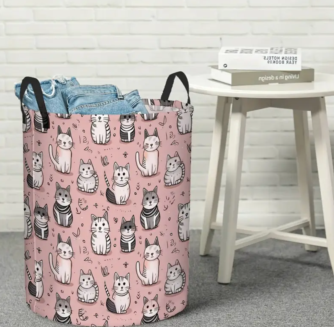 Pink laundry basket with cats