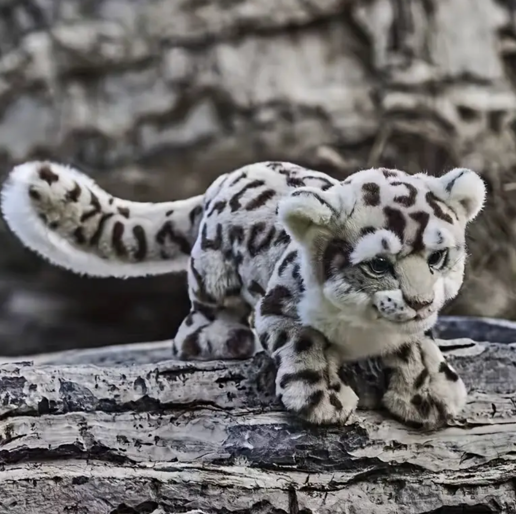 Peluche léopard des neiges