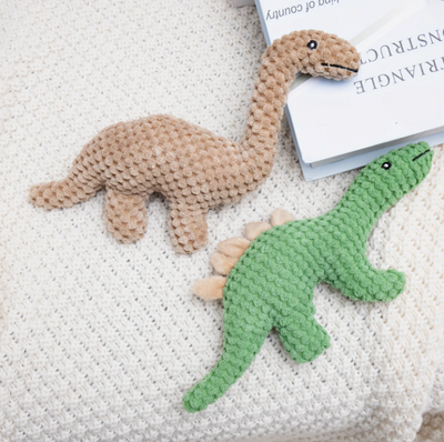 Interactief zacht kauwspeeltje in de vorm van een dinosaurus.