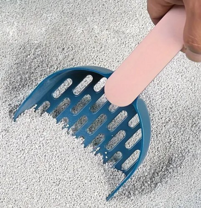 Stevige kattenbak schep van hoogwaardig plastic met comfortabele grip voor eenvoudig gebruik.