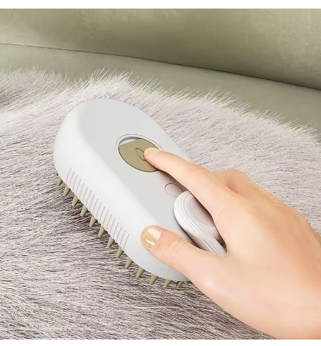 Multifunctionele stoomborstel voor katten en honden, met afgeronde tanden voor veilige verzorging en stoomfunctie voor dieptereiniging.